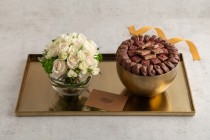 Gold chocolate tray with fresh flower