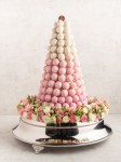 Pink Truffle Tower with silver stand and flowers